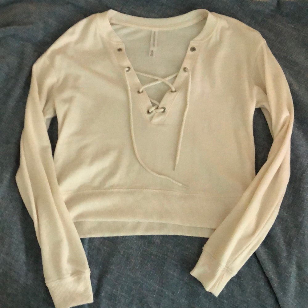 Cropped, lace-up sweater